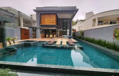 Casa com 5 suítes, 585 m² - venda ou aluguel/mês - riviera de são lourenço - bertioga/sp