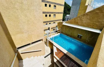 Cobertura triplex com vista para o mar à venda na praia de pitangueiras - guarujá / sp.