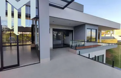 Casa á venda condomínio portal da serra com 04 suítes, escritório, toda automatizada ,vista para o vale, acabamento impecável.