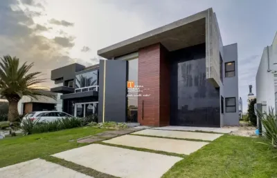Casa mobiliada,  04 suítes no condomínio riviera em  xangri-lá - rs
