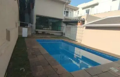Casa com piscina com 3 quartos sendo 3 suites edicula churrasqueira 4 vagas  salao de festas fl55