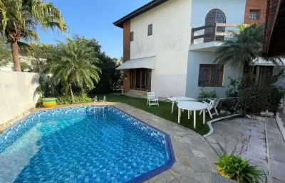 Linda casa térrea em condomínio, reformada, 3 suites, 5 wc, 6 vagas e churrasqueira - fl22