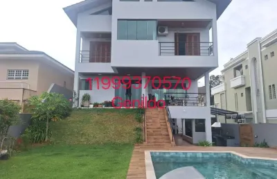 Sobrado em condomínio com piscina 4 quartos 4 suites 6 vagas salão de festa armários planejados fl55