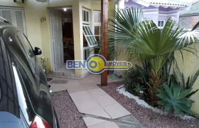 Casa com dois dormitorios, patio frentes e fundos a venda em gravataí.
