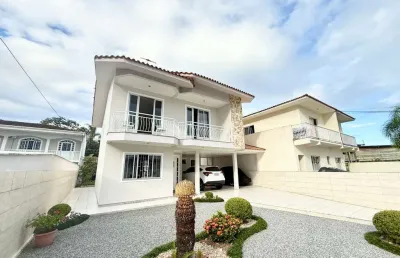 Casa com 3 quartos à venda na rua graciliano carlos de quadros, 64, centro, palhoça por r$ 1.060.000