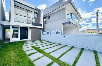 Casa com 3 quartos à venda na lídia hames huller, 12, forquilhas, são josé por r$ 590.000