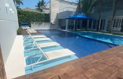 Magnifica casa em condomínio fechado no jardim acapulco (guarujá), alto padrão, mobiliada, 10 suítes, amplo espaço gourmet !!