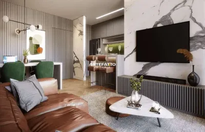 Apartamento com 2 suítes e lavabo com 1 vaga na praia do itaguá em ubatuba