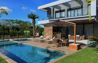À venda | 600 m², alto padrão, piscina, varanda gourmet, 4 suítes e 4 vagas - praia de jurerê internacional, florianópolis.