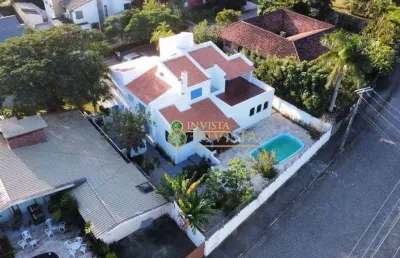 À venda | casa de 346 m², 5 quartos, piscina privativa e 4 vagas – com vista para a lagoa da conceição, florianópolis