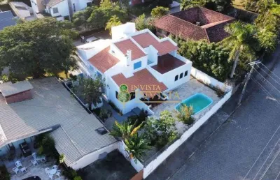 À venda | casa de 346 m², 5 quartos, piscina privativa e 4 vagas – com vista para a lagoa da conceição, florianópolis