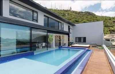 Varanda gourmet com piscina e jacuzzi, vista mar e 4 quartos - à venda próximo à ufsc na trindade.