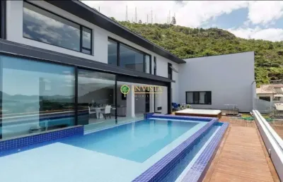 Varanda gourmet com piscina e jacuzzi, vista mar e 4 quartos - à venda próximo à ufsc na trindade.