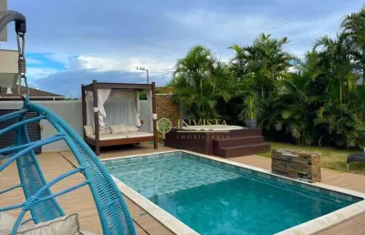 Em condomínio fechado com 3 suítes,  jardim com piscina, jacuzzi e 4 vagas no são joão do rio vermelho - á  venda em florianópolis