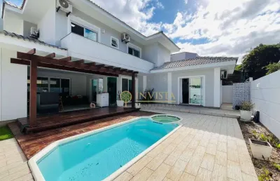 Em condomínio fechado com espaço gourmet, área de piscina, 4 quartos e 2 vagas à venda na vargem pequena.