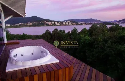 Alto padrão, hidromassagem com vista permanente para o mar, 7 quartos, piscina com deck e 4 vagas - à venda em cacupé.