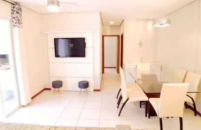 À venda com 2 quartos e sacada com churrasqueira - canasvieiras, florianópolis.