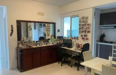 À venda em barreiros! sacada com churrasqueira, mobiliado, 2 quartos, 1 vaga de garagem e área de lazer completa.