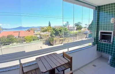 À venda em jurerê! vista mar, sacada com churrasqueira, 3 quartos e 2 vagas de garagem.