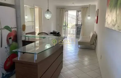 À venda na praia de jurerê internacional! 2 quartos, sacada com churrasqueira e 2 vagas de garagem.