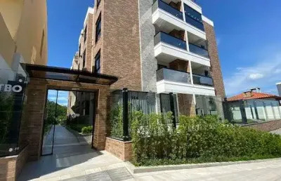 À venda no bairro coqueiros! garden, varanda gourmet com churrasqueira, 2 quartos e 2 vagas de garagem.