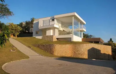 À venda | condomínio fechado, 461 m², vista livre para o mar e pôr do sol, 5 vagas de garagem - cacupé, em florianópolis.