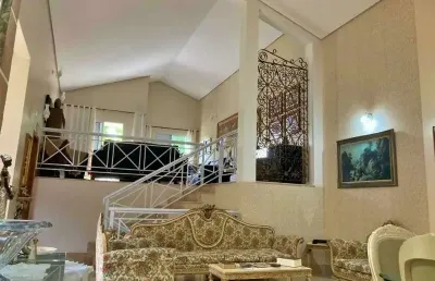 Bela  casa com três suítes , área de laser com piscina e churrasqueira