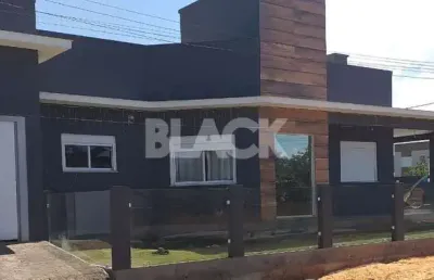 Casa com 3 quartos à venda na Rua Otávio Perraro, 881, Igra Sul, Torres