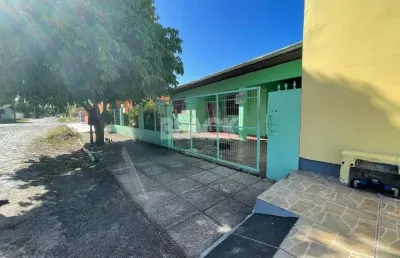 Terreno com 2 casas com 5 quartos no total a venda em torres rs