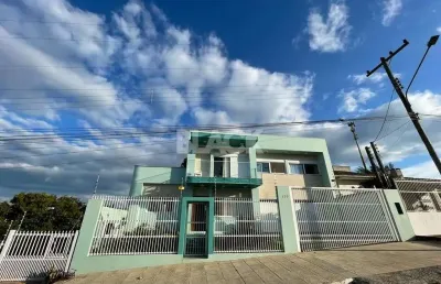 Casa com 4 suítes no bairro centenário em torres rs