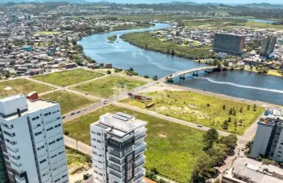 Apartamento no ibiza com pé direito duplo e sacada em torres rs