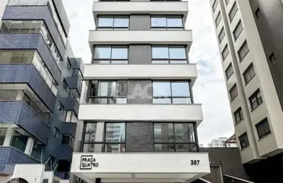 Apartamento com 2 suítes próximo a quatro praças em torres rs
