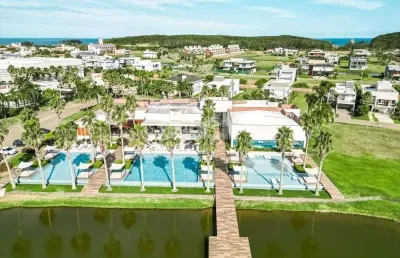Lote fundos lago no condomínio ilhas park em torres rs