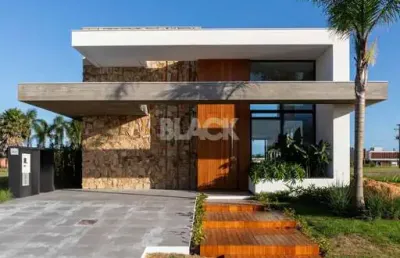 Casa à venda em condomínio fechado no ilhas park em torres rs