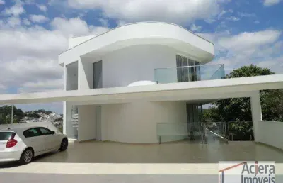 Granja  viana - projeto moderno, buscando valorizar a luz natural e com uma vista deslumbrante ao lado de uma área de preservação