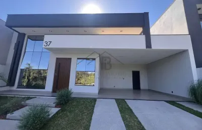 Imperdível casa em condomínio à venda em indaiatuba-sp, 3 suítes, 194m², 4 vagas no jardim laguna!