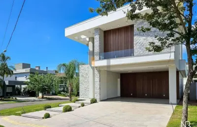 Casa com 3 suítes à venda,  condomínio alphaville - gravataí