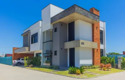 Vende sobrado novo em condomínio com 3 suítes em canoas.