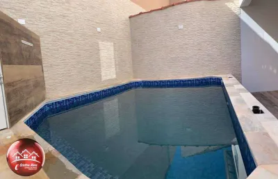 Sobrado geminado com garagem livre e piscina - próximo da praia - r$930.000.