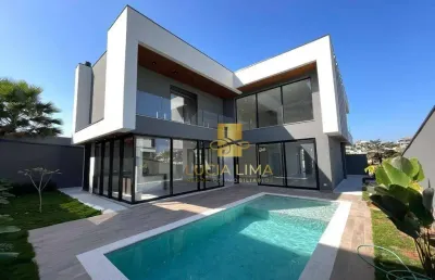 Sobrado luxuoso, com piscina incrível,  4 suítes à venda, 440 m² por r$ 4.300.000 - condomínio residencial alphaville ii - são josé dos campos/sp