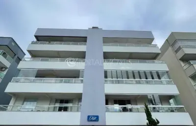 Amplo apartamento mobiliado com churrasqueira e suíte em bombas – residencial elisa