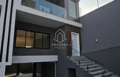 Sobrado triplex em condominio - terraço e subsolo - 4 quartos - 210m²