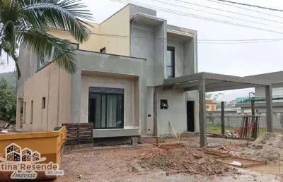 Casa em condomínio fechado com 4 quartos à venda na praia da lagoinha, ubatuba  por r$ 1.800.000