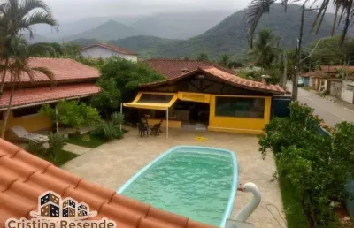 Casa com 4 quartos à venda no massaguaçu, caraguatatuba  por r$ 1.350.000