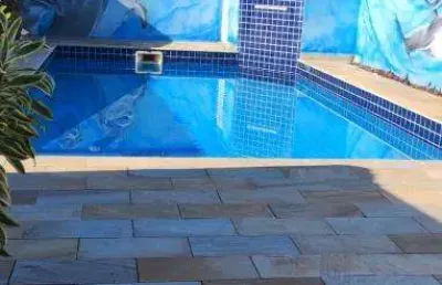 Casa com 4 quartos à venda no prainha, caraguatatuba  por r$ 1.300.000