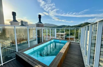 Apartamento com dois quartos na praia grande (novo)