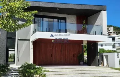 Casa em condominio com 5 dormitorios sendo 3 suites + 2 demi e 6 vagas na praia brava em itajai