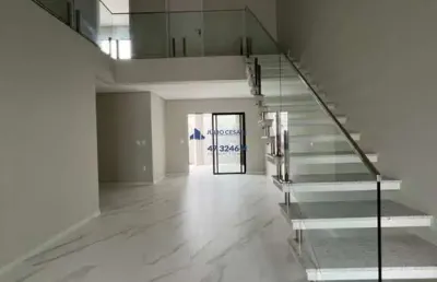 Sobrado de alto padrao   itajai   3 suites   2 vagas de garagem