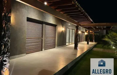 Exclusivo rancho à venda no condomínio enseada 2 com 4 suítes e   com espaço para vários veículos / próximo a br 153 !!