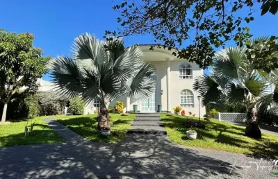 Sobrado à venda no aldeia do vale com 4 suítes, 2 lofts independentes, lazer completo e localização privilegiada